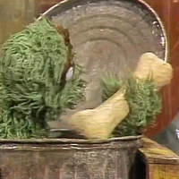 1250 Oscar bone.jpg (70 KB) Oscar's dinosaur skeleton in Sesame Street Episode 1250