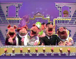 a chorus of pigs singing "That's Entertainment"