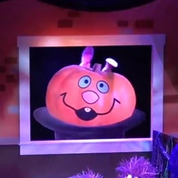 Abbot the Rabbit transformed into a pumpkin in Elmo the Musical: Live! at Sesame Place: Halloween