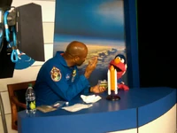 ElmoLelandMelvinNASAConversation.jpg (72 KB) Elmo and Leland Melvin