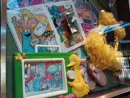 A Sesame Street book and toy help represent the 1970s.