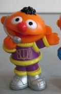 Ernie in a spacesuit with a headset