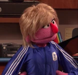 Sue (Jennifer Barnhart)