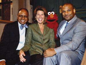 Westin with , chief operating 
officer of Sesame Workshop, (left) and , the puppeteer of Elmo.