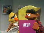 Ernie and Bert: The HELP Sign