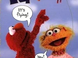 Elmo and Zoe Fly a Kite