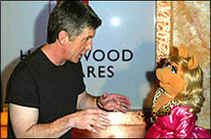 Host Tom Bergeron with Miss Piggy (May 12, 2003)