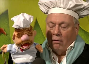 Dutch celebrity chef Joop Braakhekke and his Muppet counterpart at the premiere