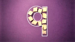 11 chunks of queso (cheese) form a lowercase q.