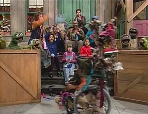 Tarah's chair becomes the Grouch Float for a yearly parade.