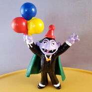 The Count with balloons