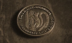 The Lemur's calling card coin