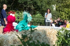 Obama with Elmo and Rosita at the annual fall harvest of the White House Kitchen Garden on the South Lawn on October 30, 2013.