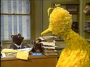 Big Bird consults the Bureau of Missing Bears in order to find a lost .