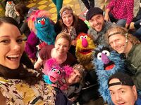Suki Lopez with several Muppet performers on the set of season 51