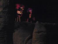 "The Lost Treasure of the Fraggles": Gobo and Red cross a ledge during their journey to find the treasure