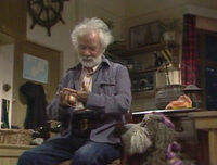 Captain.jpg (15 KB) The UK's "Doc": The Captain in his lighthouse.