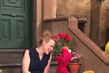 Kate McKinnon and Elmo