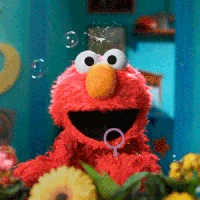 Elmo blows bubbles in the Season 46 opening