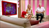 Schofield and Holly Willoughby interviewing Elmo on This Morning.
