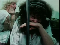 "Singing Fish" Louise Gold laughs with Betsy Baytos in background. From Of Muppets & Men: The Making of The Muppet Show