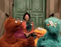 Baby Bear blows on a pinwheel in Sesame Street Episode 3970