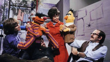 Cooney-berternie.jpg (43 KB) Joan Ganz Cooney intermingling with Ernie and Bert