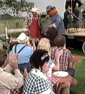 Lulu Roman as waitress Lulu, lower right center, looks away from a grouchy special guest star.