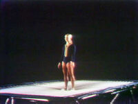 'Up' and 'Down' She repeatedly jumps up and down on a trampoline. (First: Episode 0526)