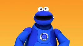 Puppet Mecha Cookie Monster sings "Do the Mecha Cookie Dance"