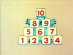 A bear stacks 10 blocks (First: Episode 2227)