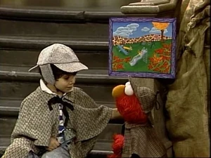 Detectives Jonathan and Elmo in Episode 2699.