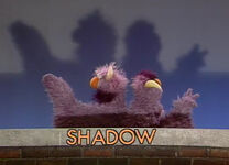 The Two-Headed Monster makes shadow puppets in a season 20 sketch.