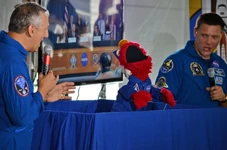 ElmoCountdown.jpg (127 KB) Elmo, Mike Massimino and Douglas H. Wheelock
