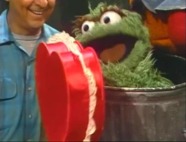 The word LOVE & OscarSesame Street Episode 3083
