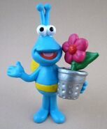 A blue Twiddlebug with a flowerpot