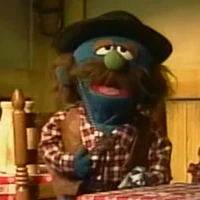 Fat Blue cowboy in "Ballad of the Sad Café"