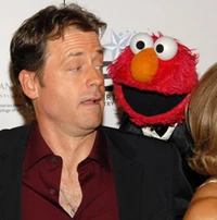 Greg Kinnear and Elmo
