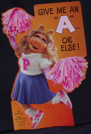 "Give me an 'A'... or else!" Miss Piggy as another threatening cheerleader 1981