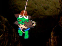 Baby Kermit as Indiana Frog in the opening of Muppet Babies.