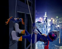 Grover climbs a wall in the Super Grover 2.0 opening