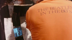 A look behind Oscar's trash can set as Caroll Spinney performs Oscar, with script pages attached nearby with Oscar's lines.