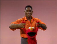 Blair Underwood swings Elmo 16 times (First: Episode 2794)