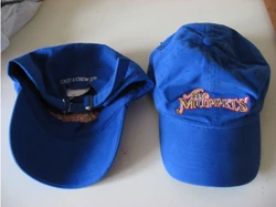 Baseball cap. The front of the cap says "The Muppets", while the back says "CAST AND CREW 2011."