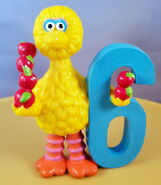 Big Bird with 6 apples