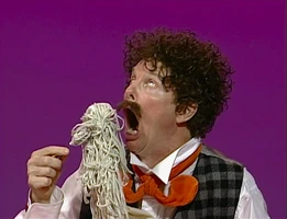Mr. Noodle eats spaghetti noodles in "Elmo's World: Food"