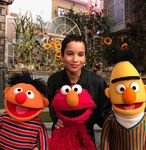 Zoë Kravitz with Ernie, Elmo, and Bert