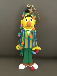 Bert grolier.jpeg (194 KB) Bert wrapped up in Christmas lights.