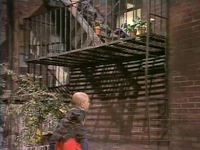 ...while Maria's apartment over 123 Sesame Street also oversees the yard.