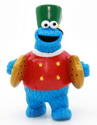 Cookie Monster with cookie cymbals